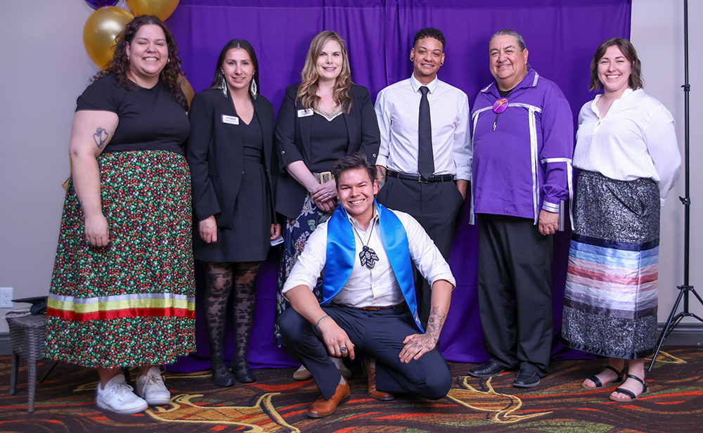 Oliver Manidoka and Laurier staff members