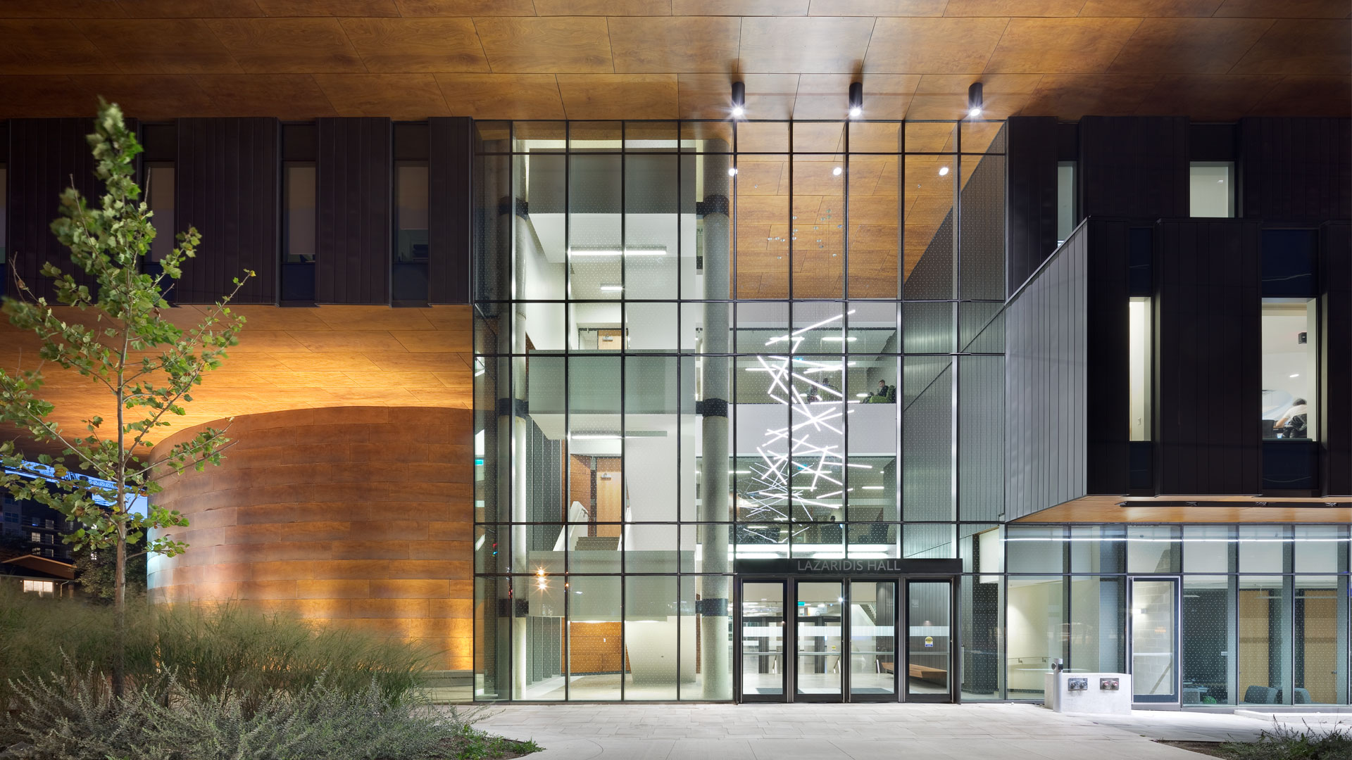 Lazaridis Hall exterior entrance at night.